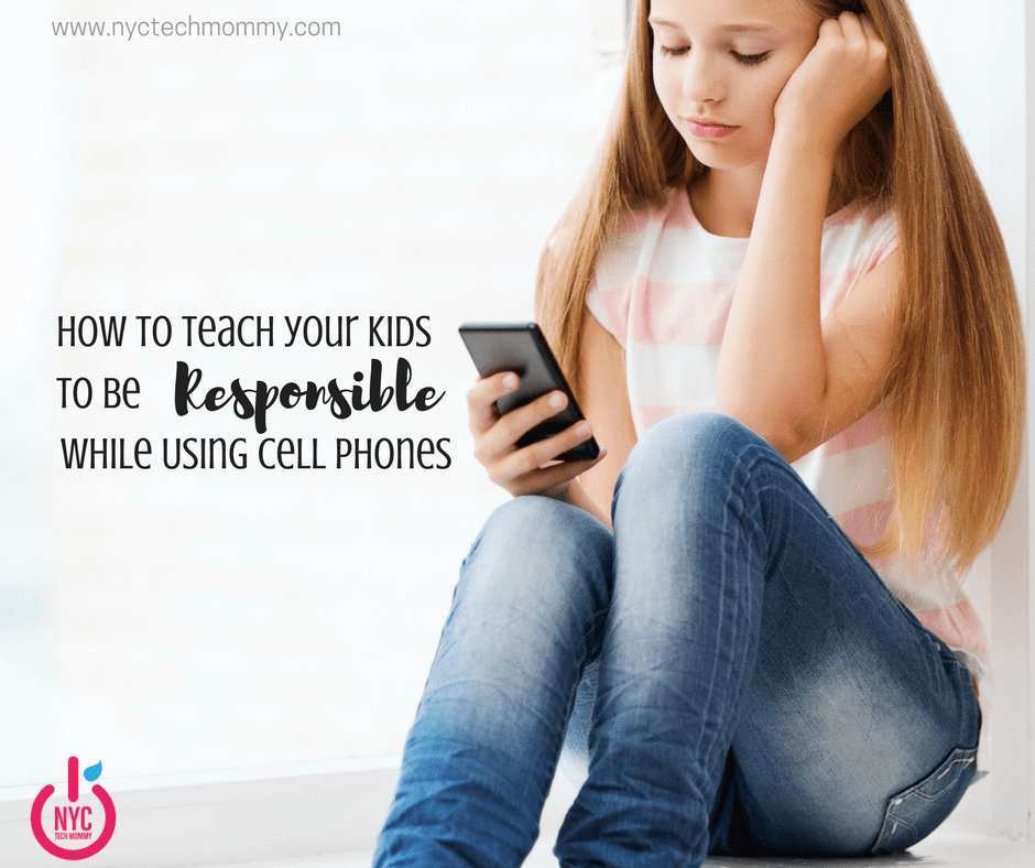 child using smartphone with parent