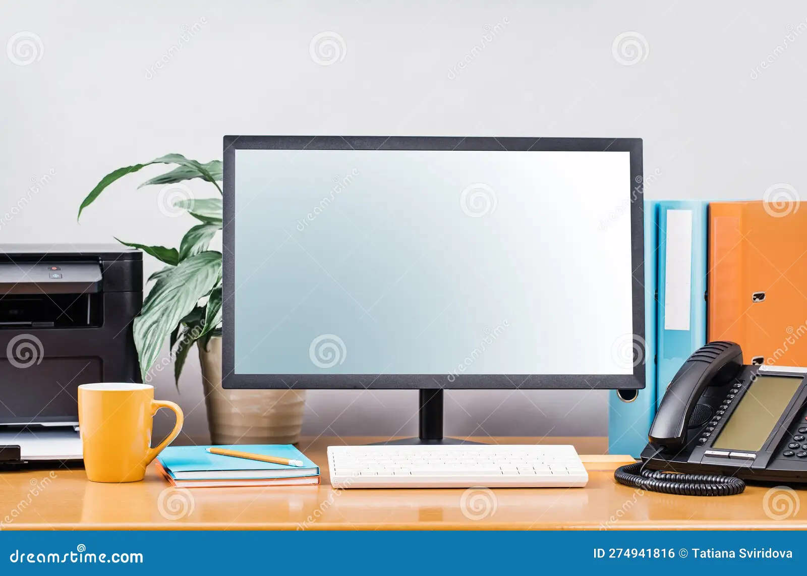 office worker traditional monitor ergonomic setup