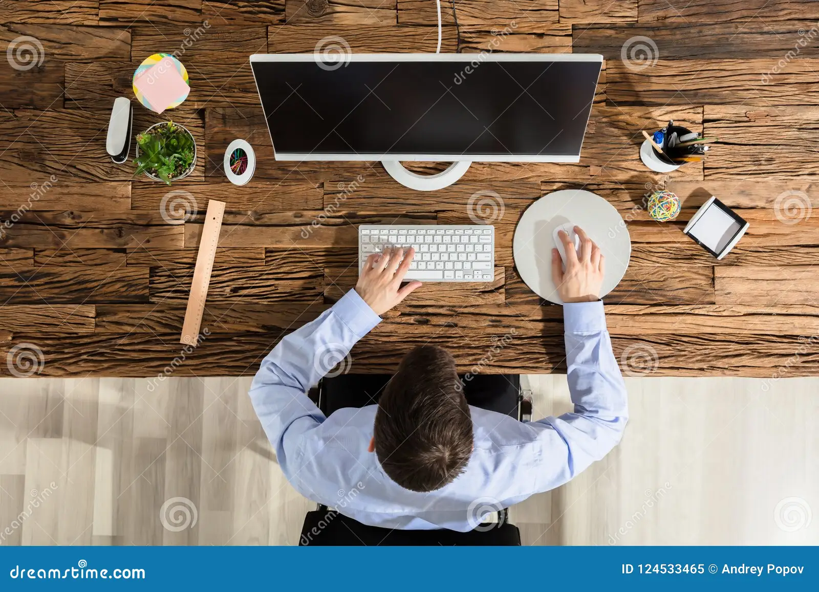 person sitting too close to ultrawide monitor