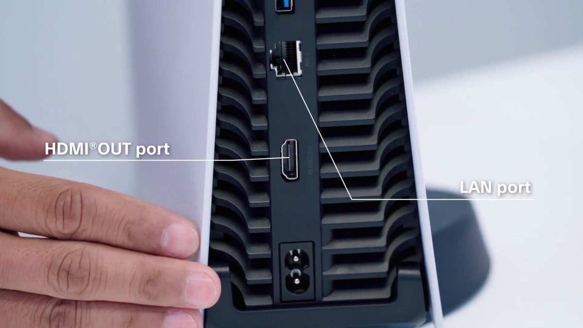 PS5 HDMI cable connected to curved monitor