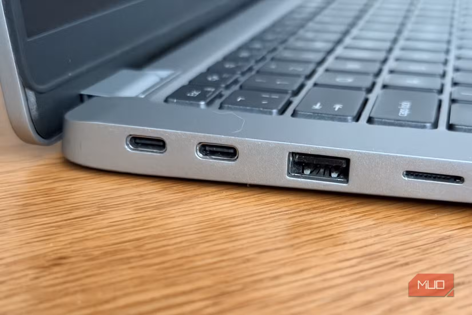 USB-C port on laptop showing Thunderbolt icon