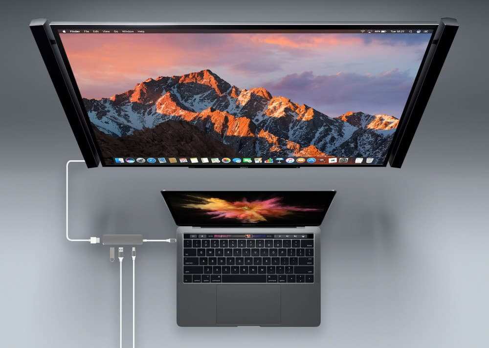 USB-C to USB-C cable connecting MacBook to monitor