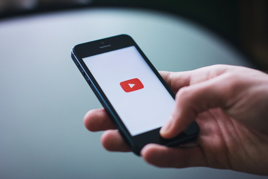 YouTube app interface on phone