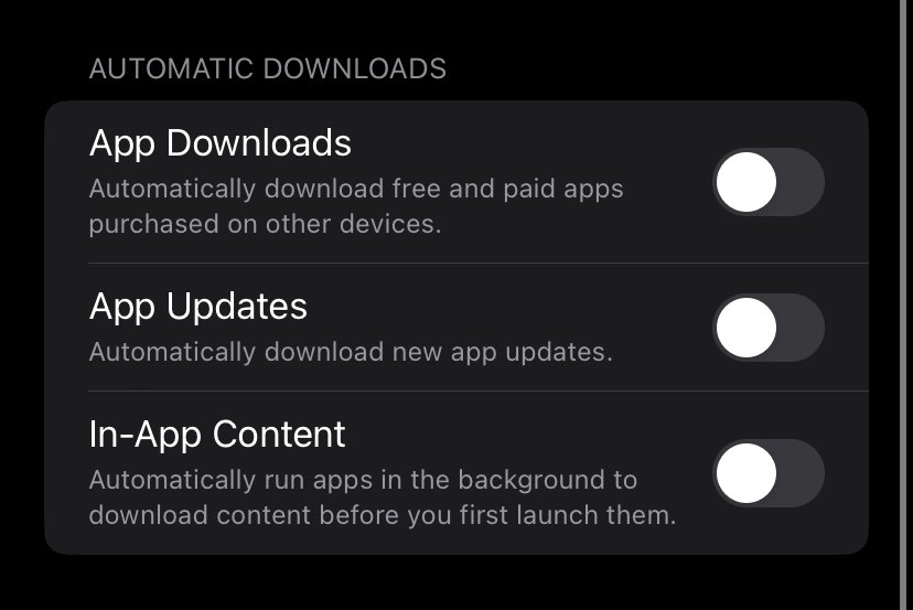 iOS automatic downloads settings